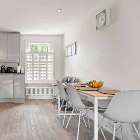 Enjoy a home-cooked meal and a cocktail at the dining table