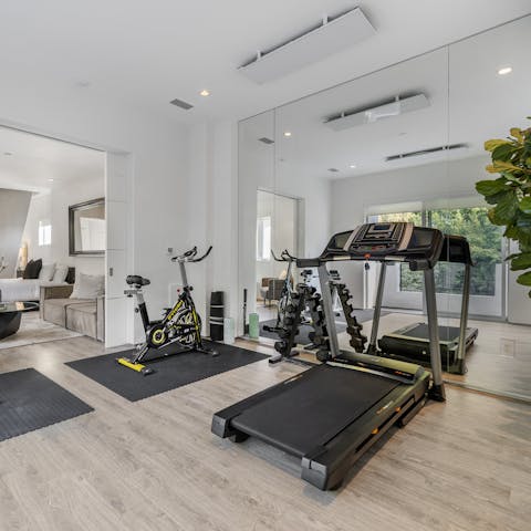 Jump out of bed and straight into a morning workout in the master suite's private gym