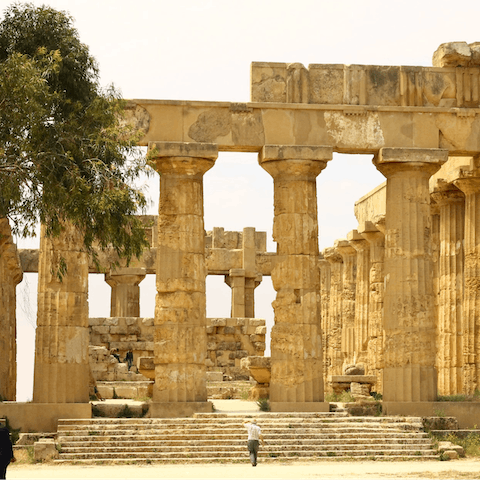 Explore the ruins of Selinunte's Archeological Park – it's a sixteen-minute drive away