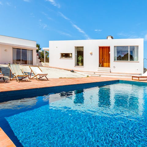 Spend leisurely afternoons relaxing by the private pool