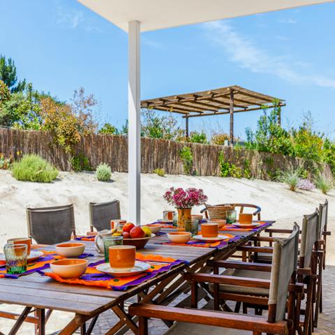 Savour balmy evening drinks and meals served on the terrace