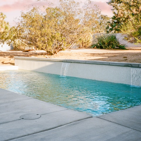 Cool off from the desert heat in your private outdoor swimming pool