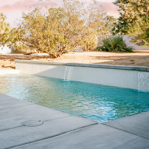 Cool off from the desert heat in your private outdoor swimming pool