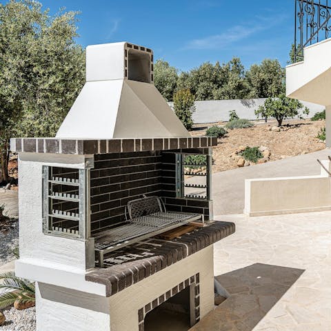 Craft some Greek delicacies on the brick barbecue and dine alfresco