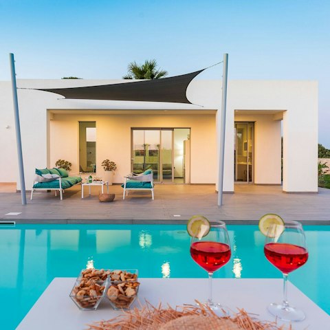 Enjoy a refreshing spritz by the pool