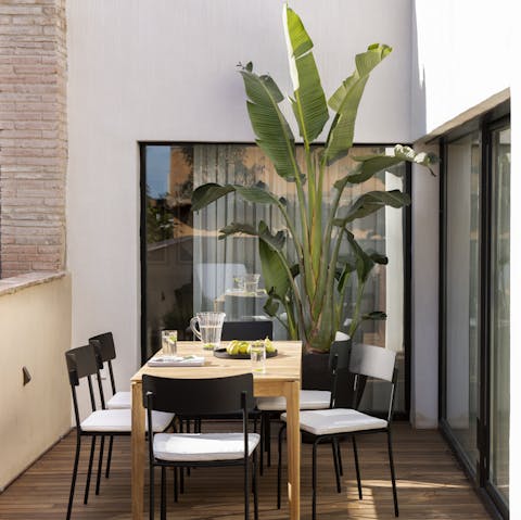 Come together for a glass of Cava at the patio table
