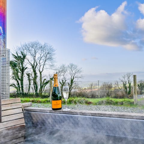 Prepare for spectacular sunsets from your private hot tub
