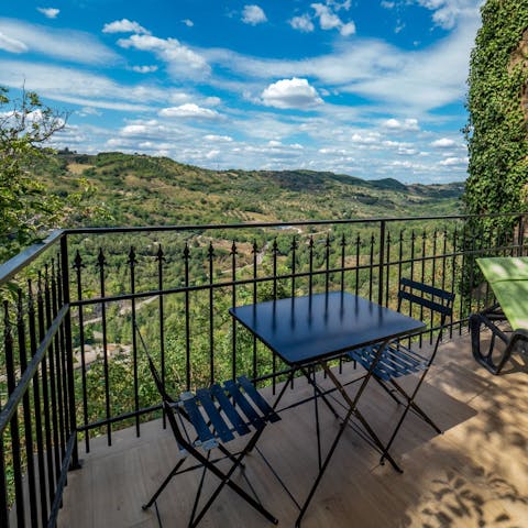 Take in the views of the Tuscan countryside from the balcony