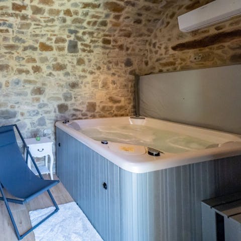Relax with a glass of Italian wine in the hot tub