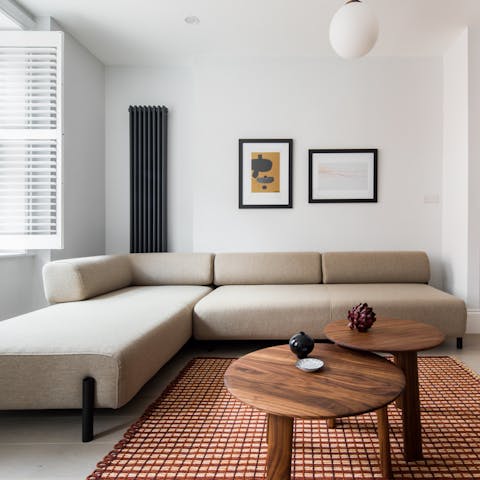 Rest your legs after a long day on the comfy sectional sofa