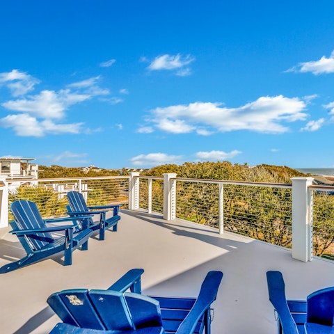 Head to the sun deck for drinks and a glimpse of the ocean