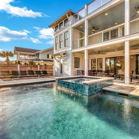 Spend leisurely afternoons enjoying the pool and Jacuzzi