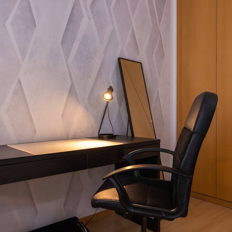 Catch up on emails from the dedicated desk space