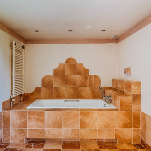 Treat yourself to a leisurely soak in one of the bathtubs