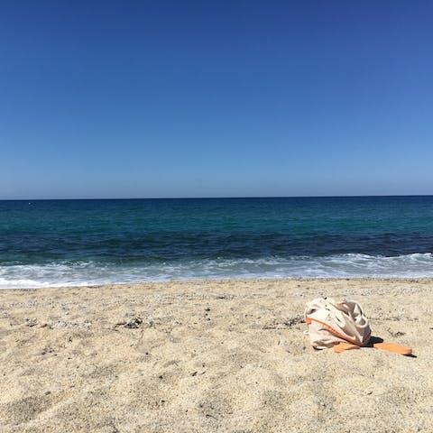 Wake up early to catch the sunrise at Kalkan Beach, an eighteen-minute drive away