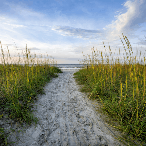 Stroll to Burkes Beach and embrace the waves