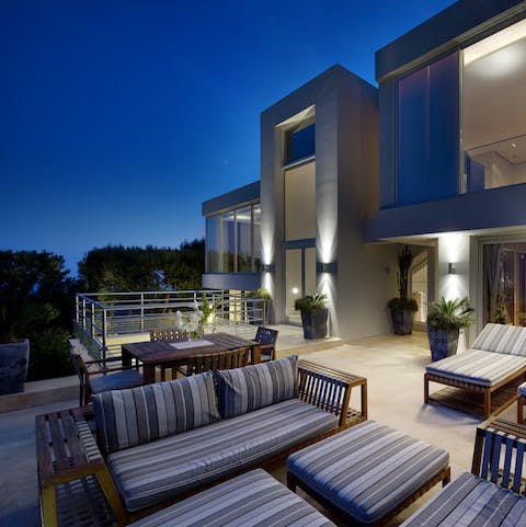 Watch the sun go down and savour a cocktail in the alfresco lounge