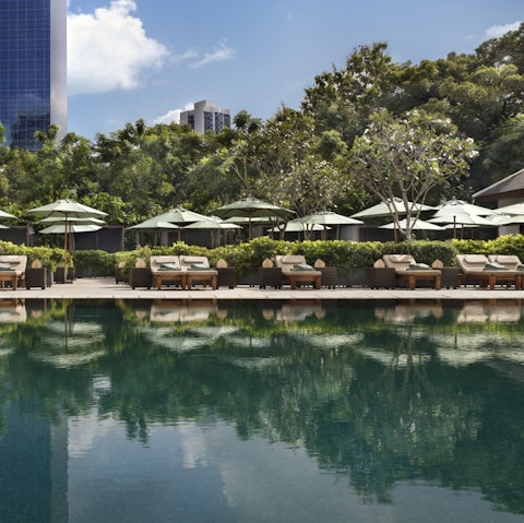 Take a dip in the stylish hotel pool, catching the sun or catching up on your reading