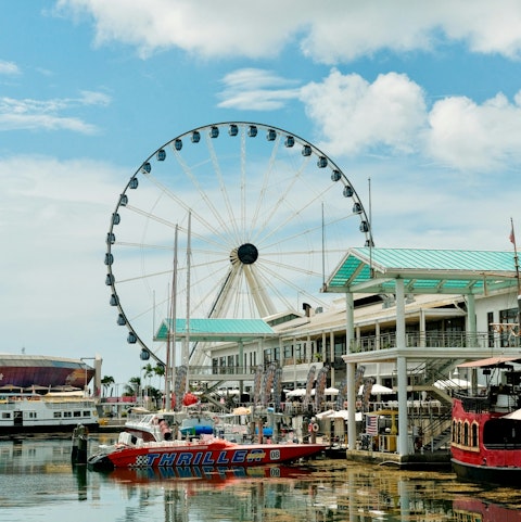 Discover Bayside Marketplace's waterfront dining and shops, ten minutes away