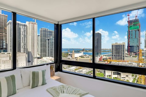Wake up to sweeping Miami and bay views