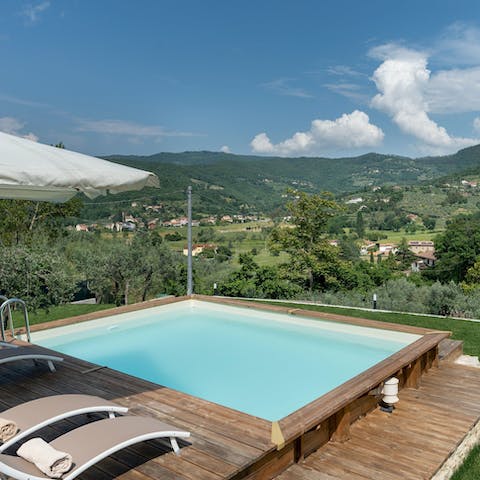 Slip into the pool as you take advantage of the sunshine and scenery