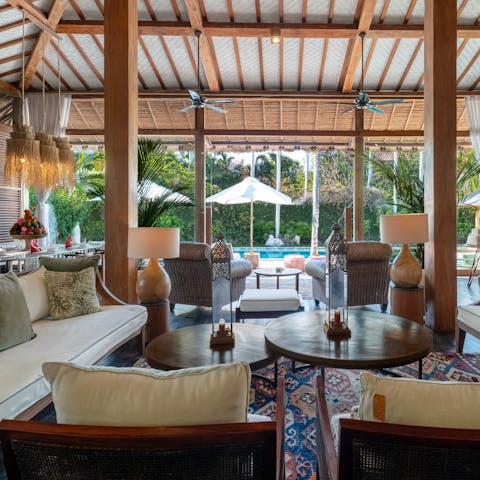 Enjoy indoor-outdoor living at its best with sliding glass doors to the terrace