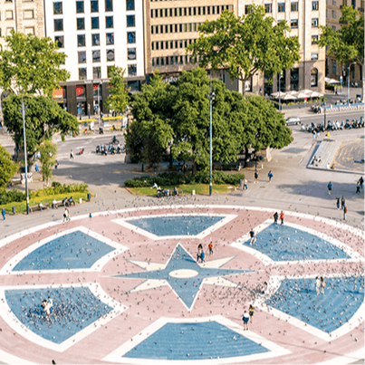 Watch the world go by from a cafe at Plaça de Catalunya