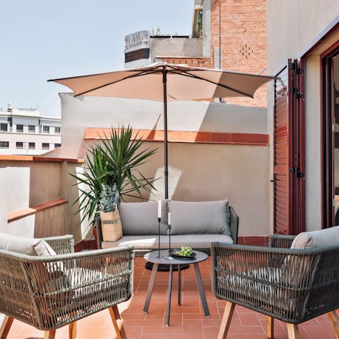 Unwind with a good book on the sun-drenched balcony