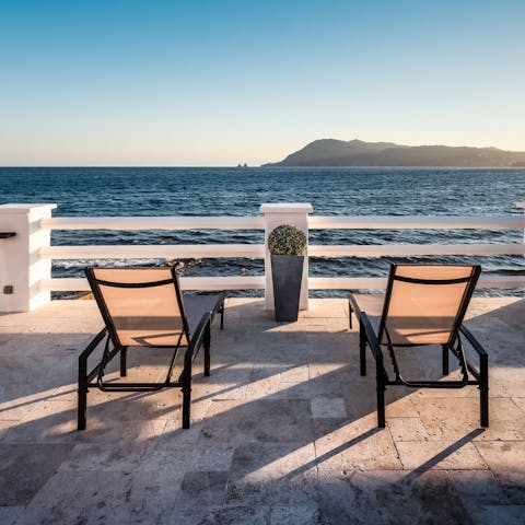 Chill out on the terrace and admire the sea views