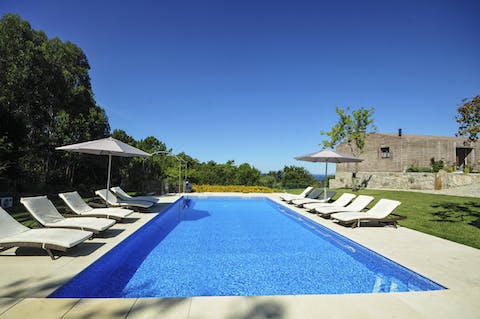 Spend blissful days lounging by the pool, soaking in the natural surroundings, and taking dips to cool off