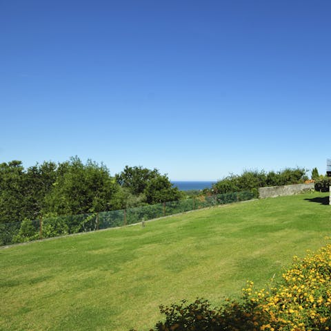 Make use of your expansive, lovely gardens with a few games of football or rounders