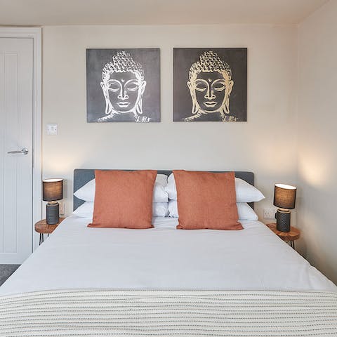 Feel zen in the bedroom with its Buddha prints