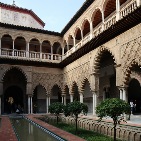 Explore the Royal Alcázar, a short walk away