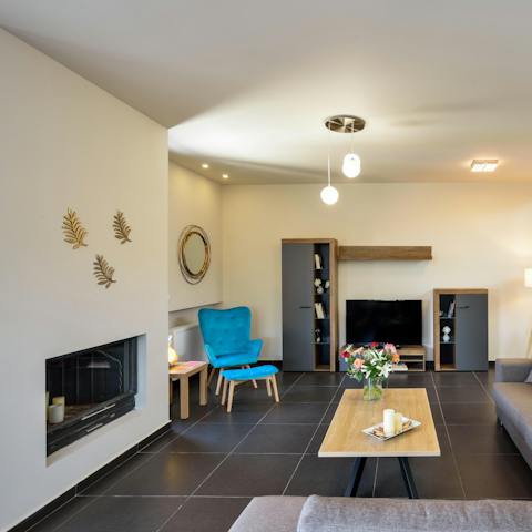 Light up the modern fireplaces in the living rooms during cooler months