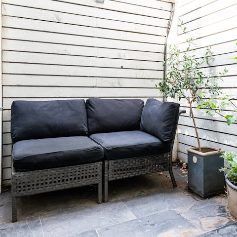 Enjoy the private patio - a rarity in central London