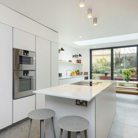 Gather for a family meal in the ample-sized kitchen