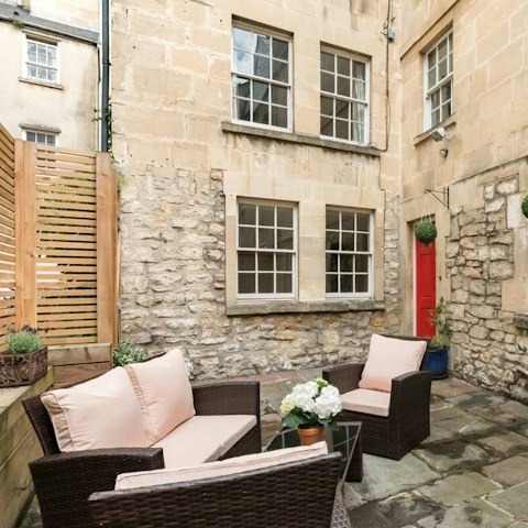 Unwind in the pretty courtyard after a busy day of sightseeing