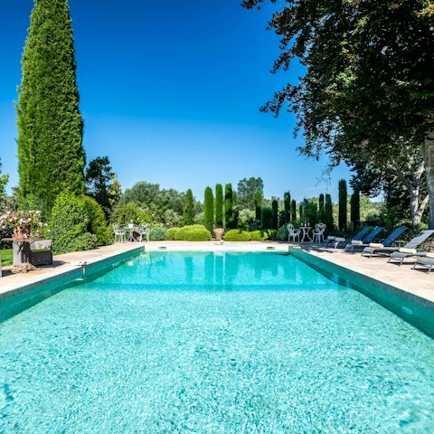 Enjoy sunny days lazing by the swimming pool