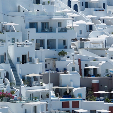 Wander the white-washed walkways of Imerovigli