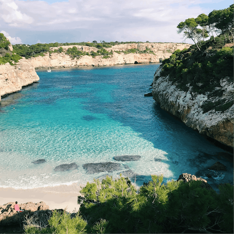 Spend your days exploring the island's rugged coastline in search of a secluded spot to call your own