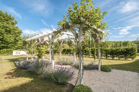 Walk the garden, stealing kisses under the arbor