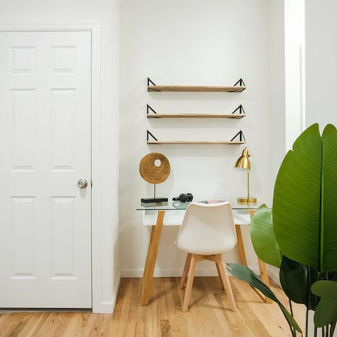 Catch up on extra work at the laptop-friendly desk