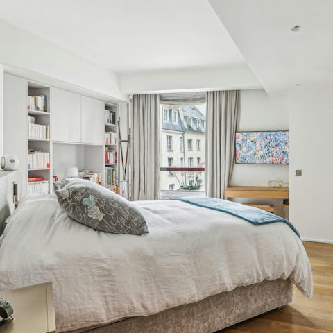Admire charming street views from the bedroom