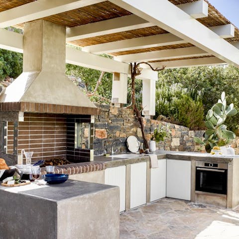 Buy some locally produced ingredients and cook to perfection in the outdoor kitchen