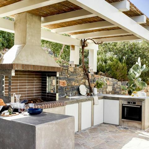 Buy some locally produced ingredients and cook to perfection in the outdoor kitchen