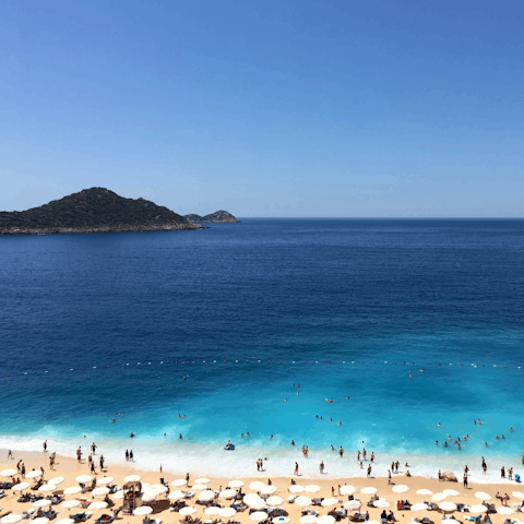 Drive less than twenty minutes to the beautiful Firnaz Koyu beach, and sunbathe by crystal waters