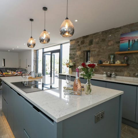 Sip wine while whipping up dinner in the charming kitchen
