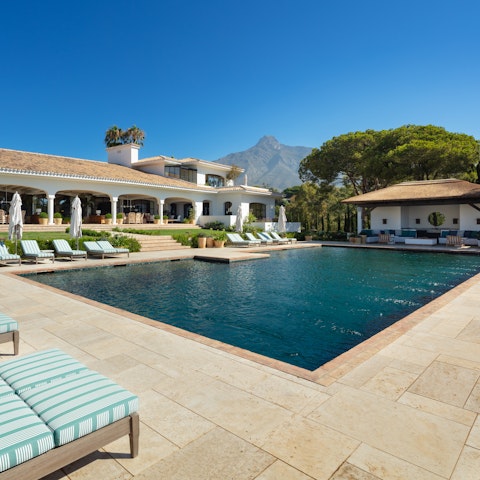 Cool off from the Andalusian heat in the villa's huge swimming pool