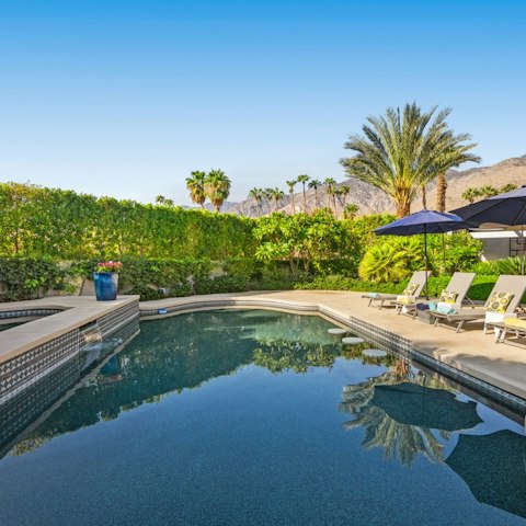 Enjoy a lazy day sprawled out by the pool