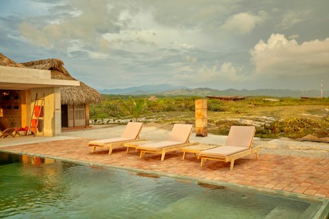 Stretch out by the pool with the Sierra Madre as backdrop